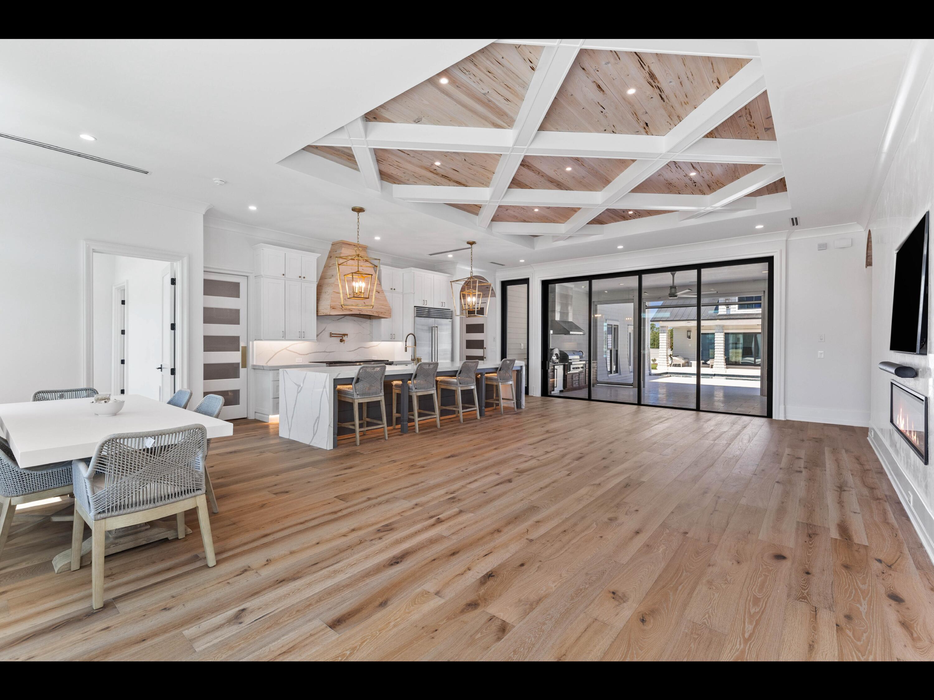 19 Quail Hollow Inlet Beach, FL 32461 - Photo 63 of 84 a view of a kitchen with furniture and wooden floor