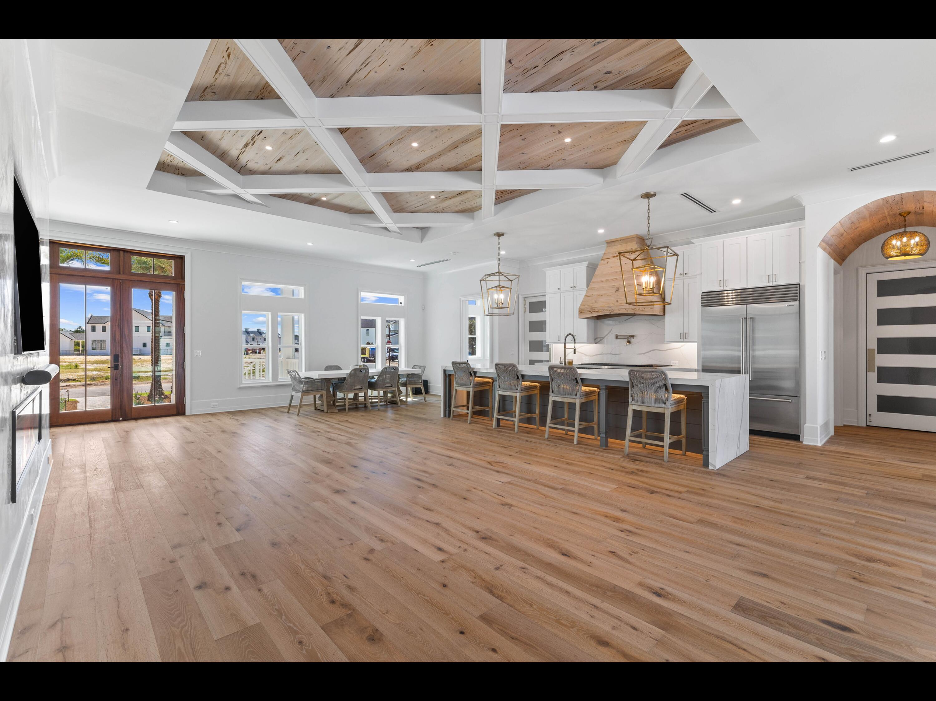 19 Quail Hollow Inlet Beach, FL 32461 - Photo 64 of 84 a room with lots of wooden furniture and a chandelier