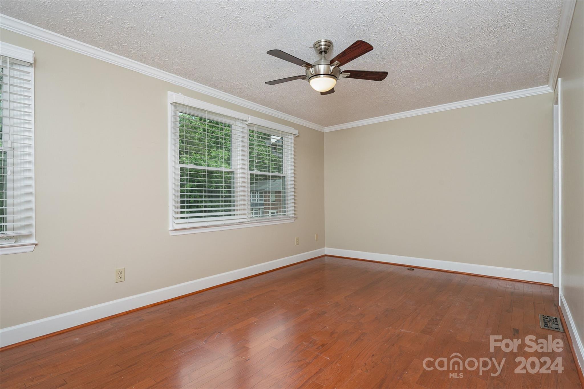 1201 Scaleybark Road, Unit D Charlotte, NC 28209 - Photo 20 of 37 wooden floor in an empty room with a window