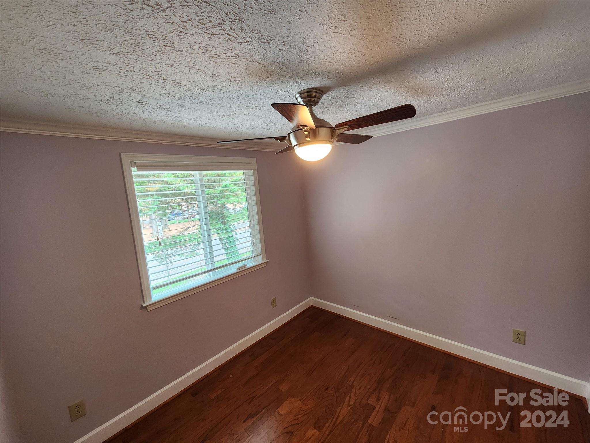 1201 Scaleybark Road, Unit D Charlotte, NC 28209 - Photo 22 of 37 an empty room with a window