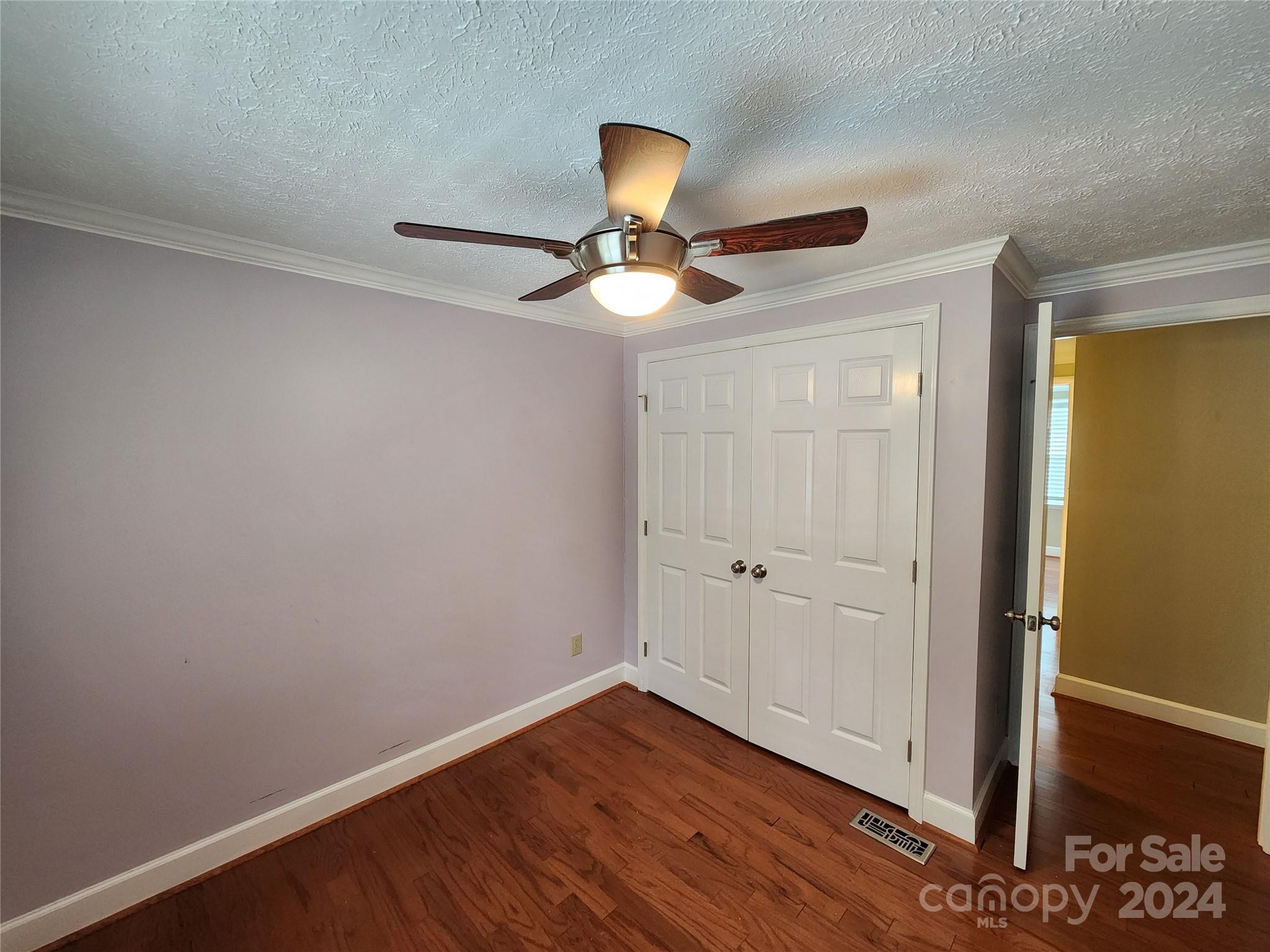 1201 Scaleybark Road, Unit D Charlotte, NC 28209 - Photo 23 of 37 a view of an empty room with wooden floor