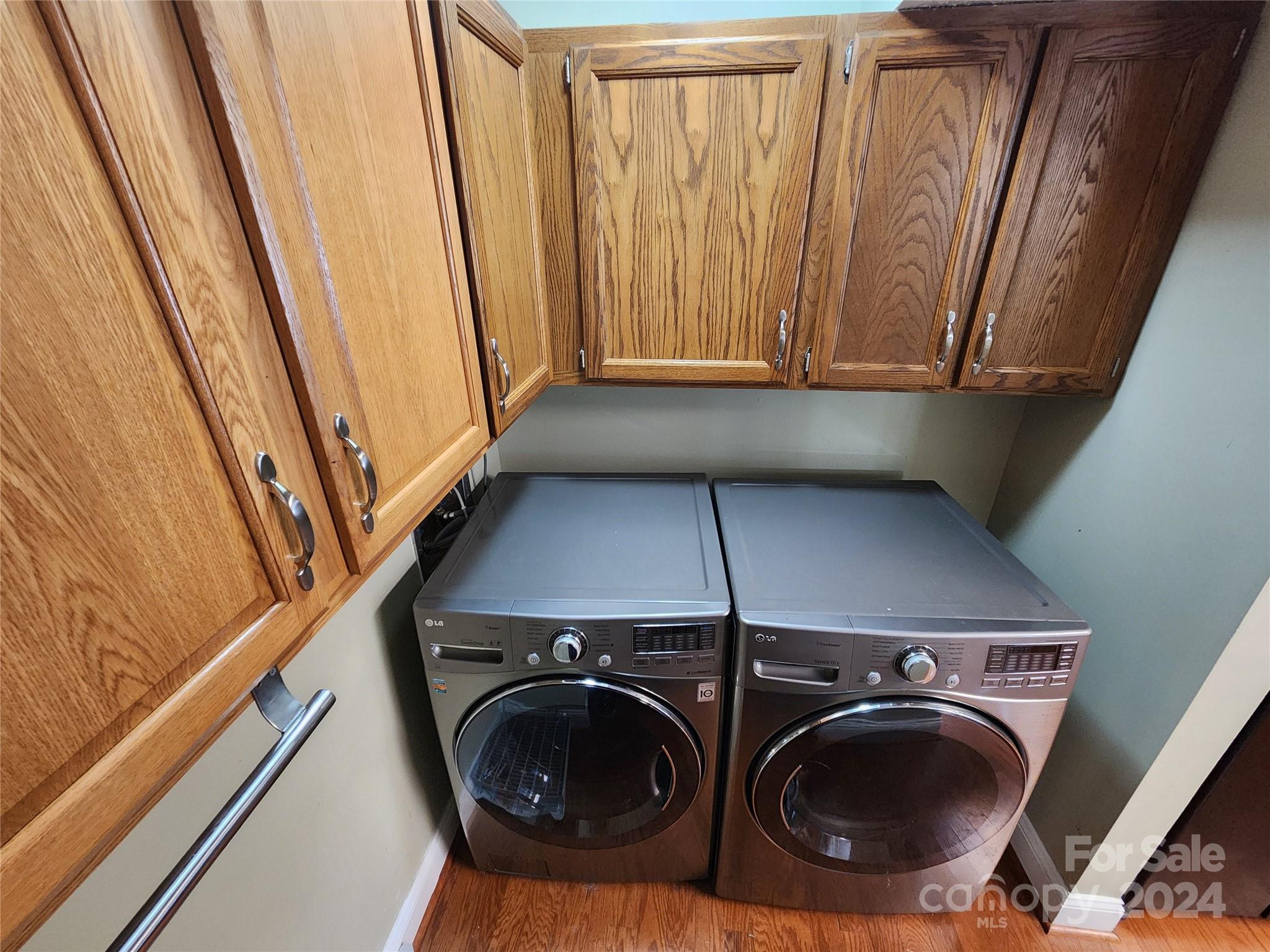 1201 Scaleybark Road, Unit D Charlotte, NC 28209 - Photo 29 of 37 a view of storage and utility room with washer and dryer