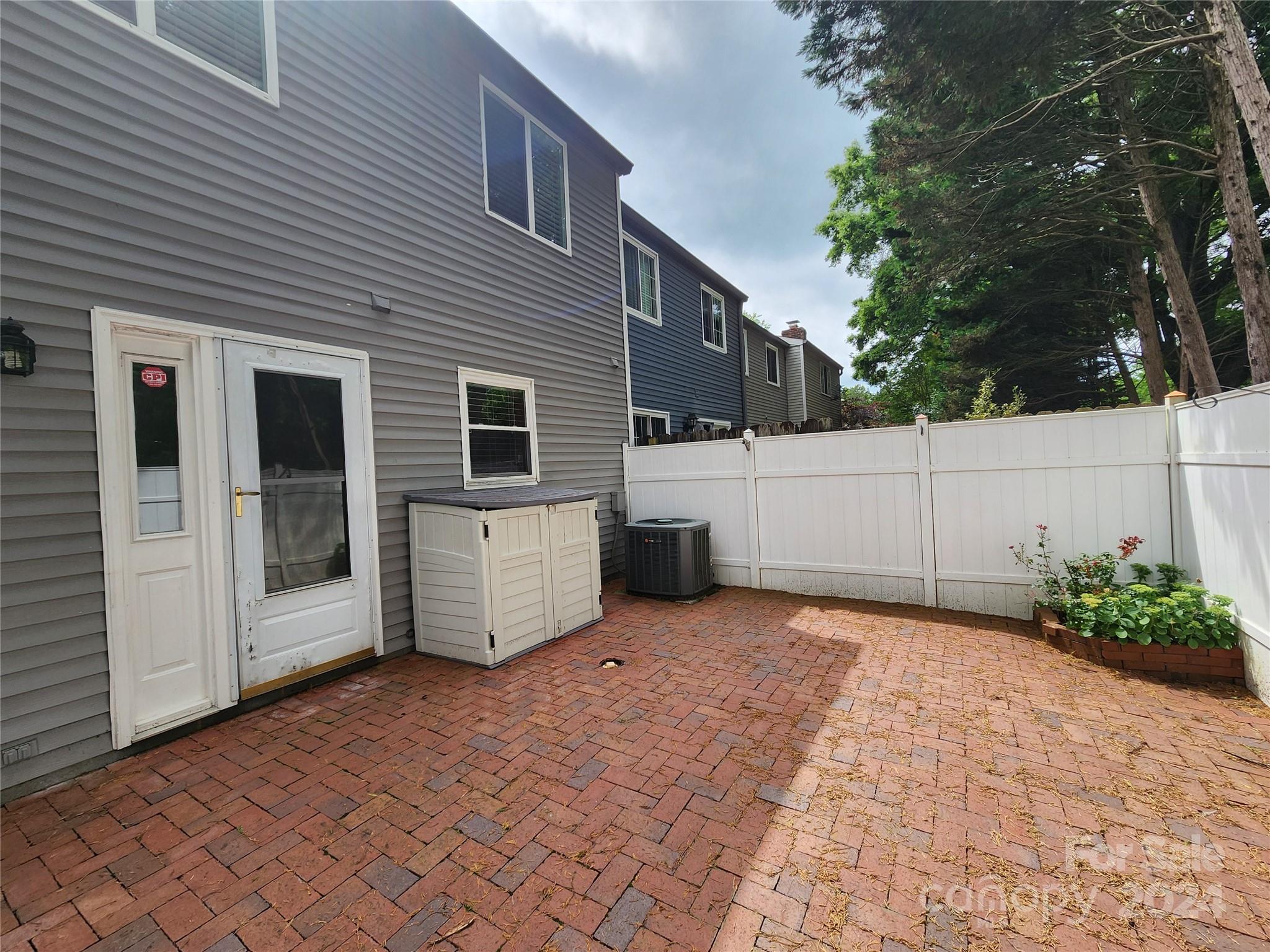 1201 Scaleybark Road, Unit D Charlotte, NC 28209 - Photo 32 of 37 a view of a house with a backyard
