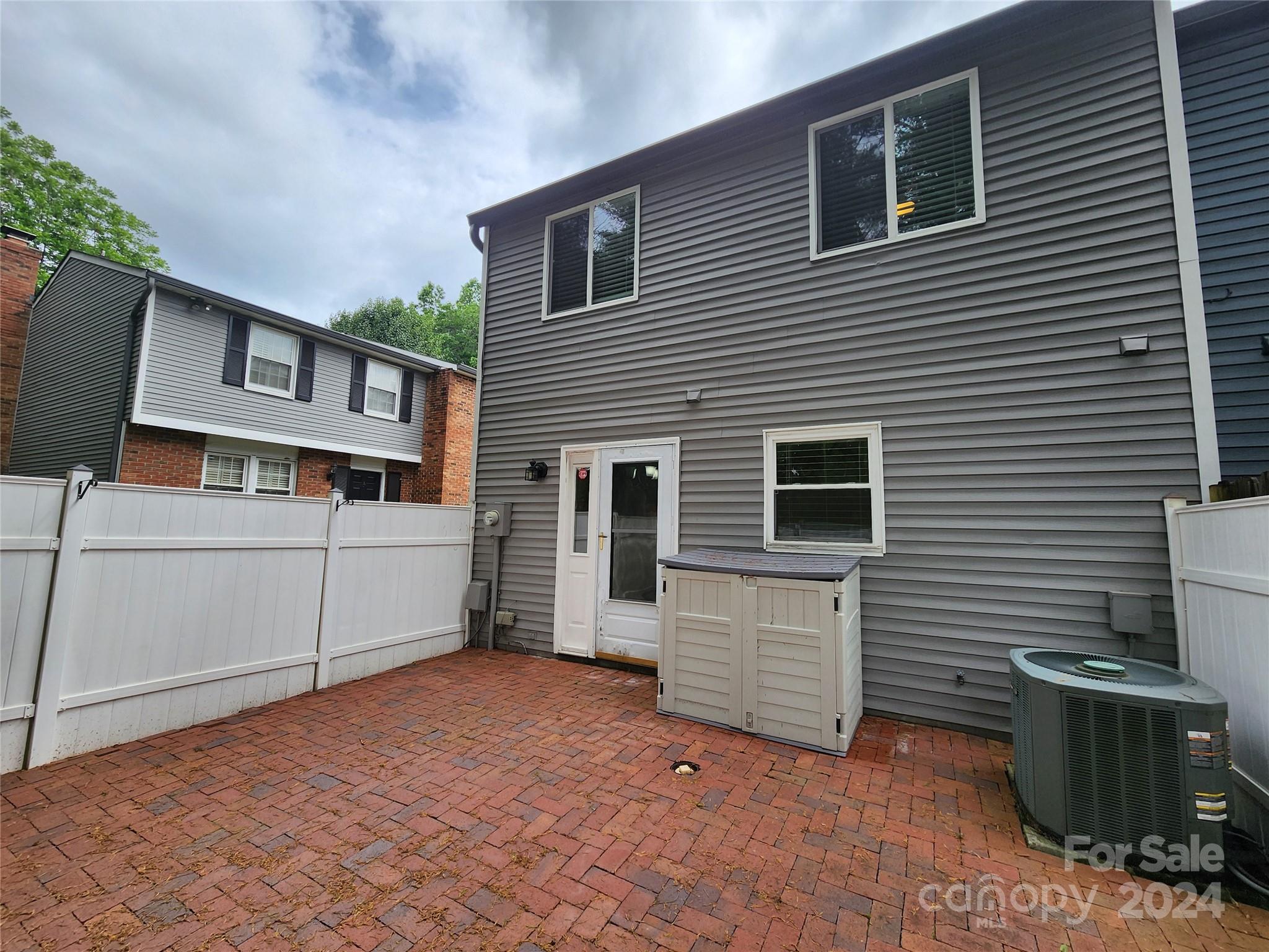 1201 Scaleybark Road, Unit D Charlotte, NC 28209 - Photo 36 of 37 a view of a house with a backyard