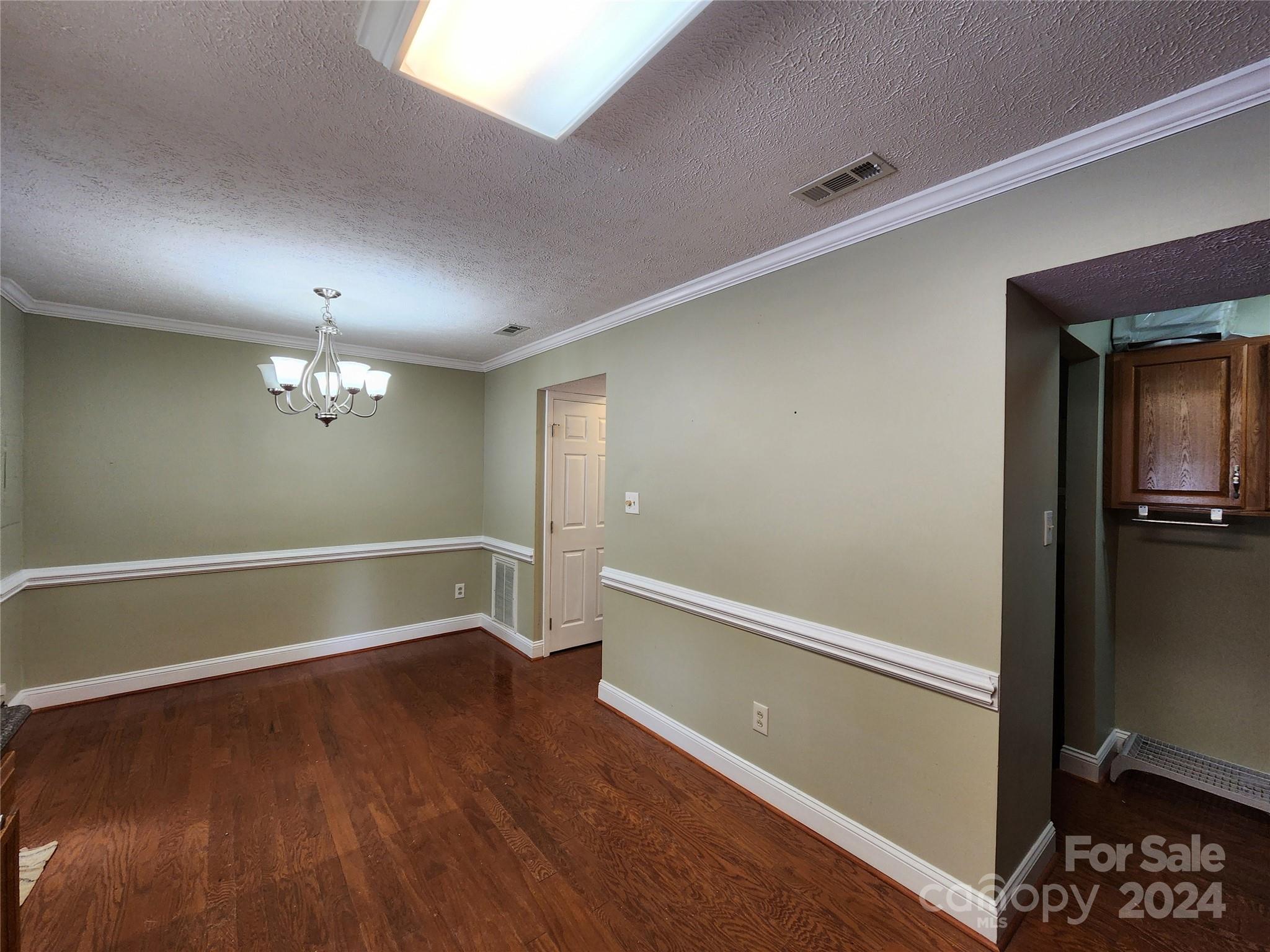 1201 Scaleybark Road, Unit D Charlotte, NC 28209 - Photo 10 of 37 a view of a room with wooden floor