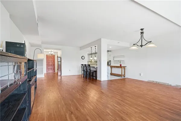 a view of livingroom with furniture and wooden floor