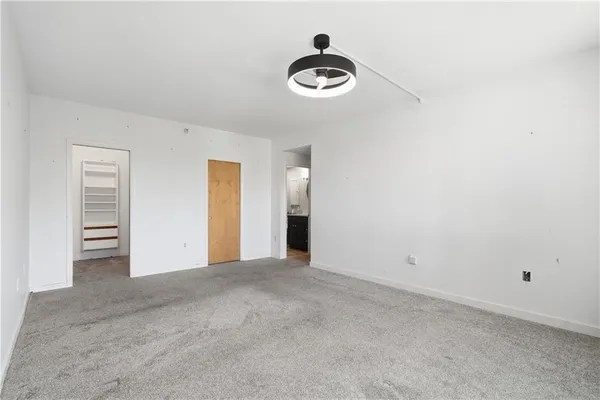 a view of a livingroom and a window