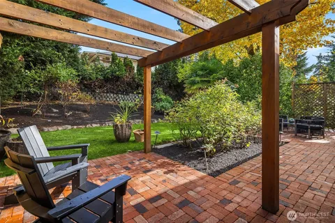 a view of a patio with a backyard