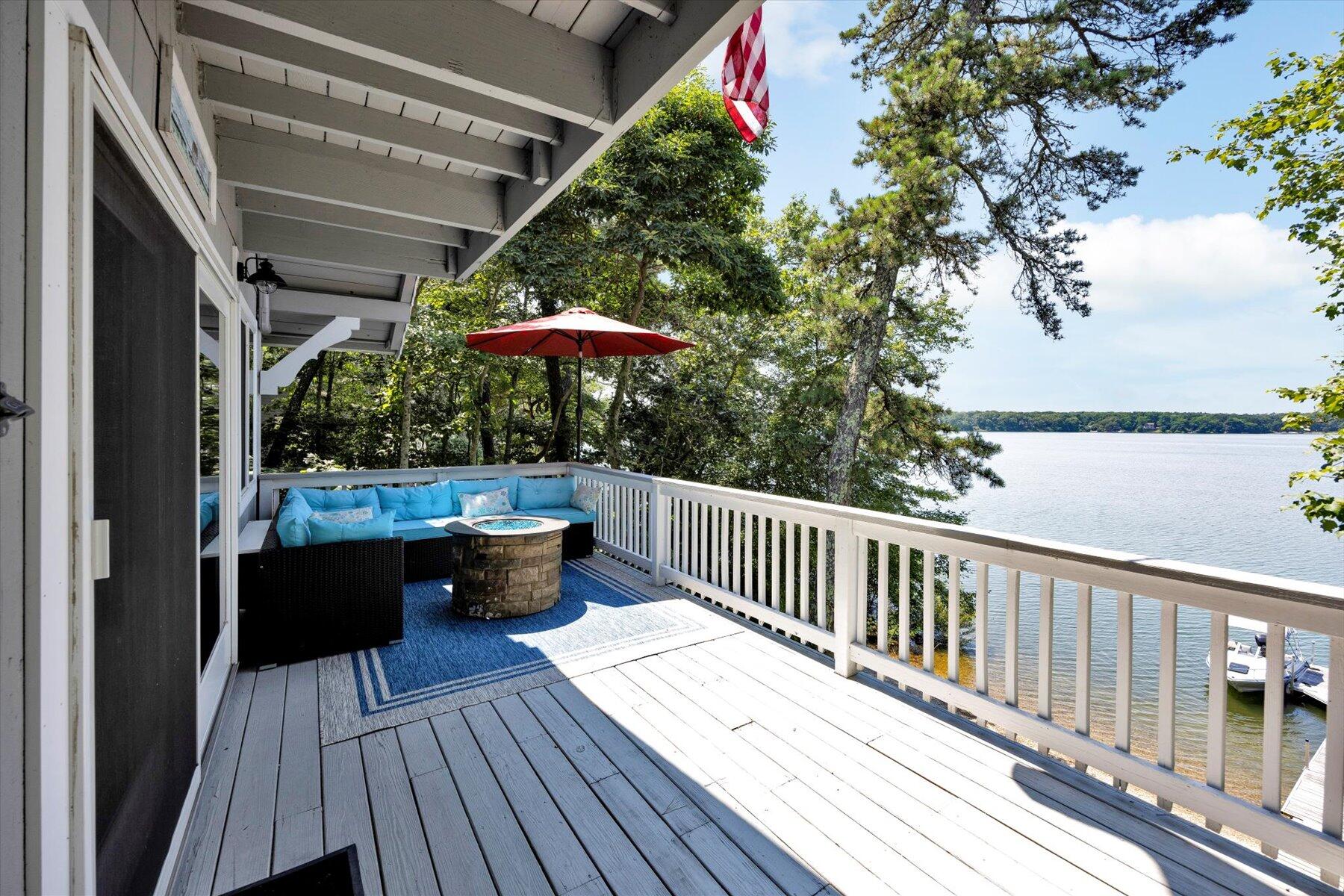 120 Wheeler Road Mashpee, MA 02649 - Photo 13 of 49 a view of balcony with wooden floor and outdoor seating