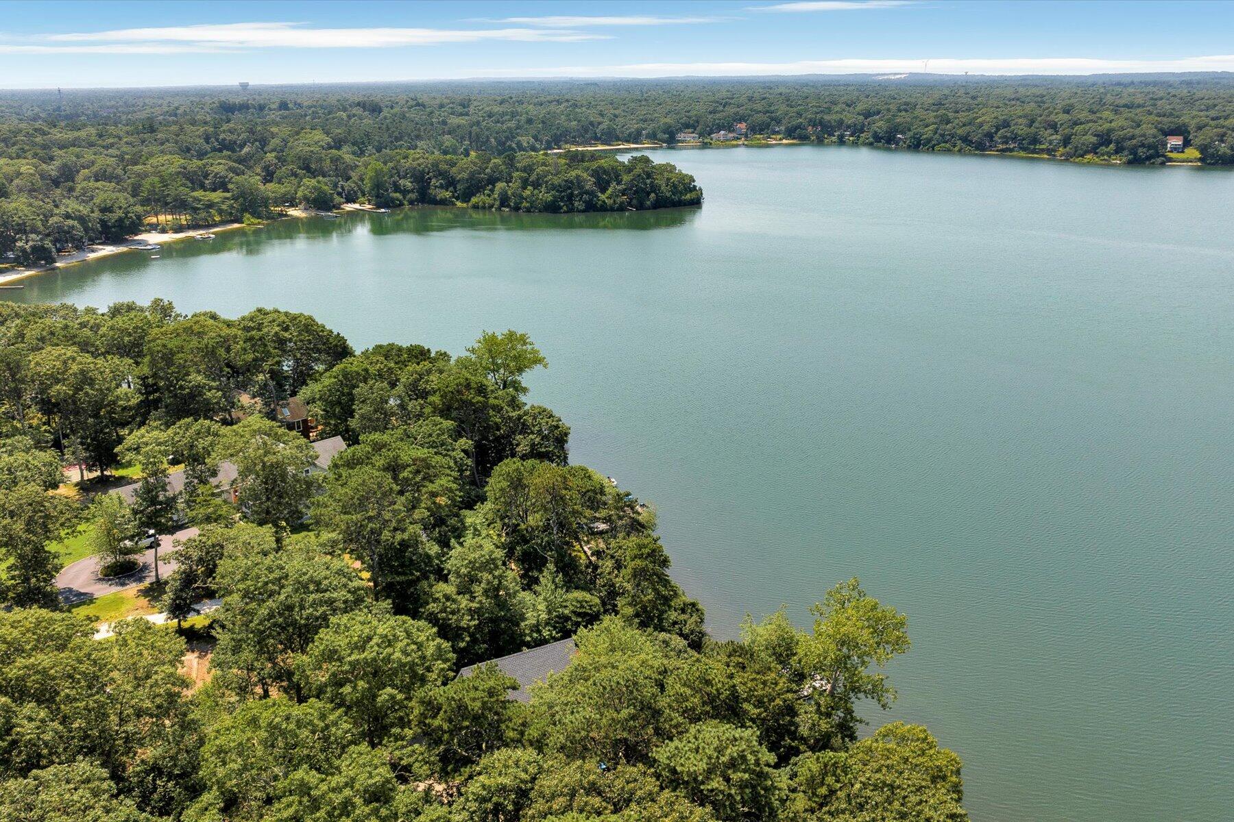 120 Wheeler Road Mashpee, MA 02649 - Photo 42 of 49 an aerial view of a houses with a lake view
