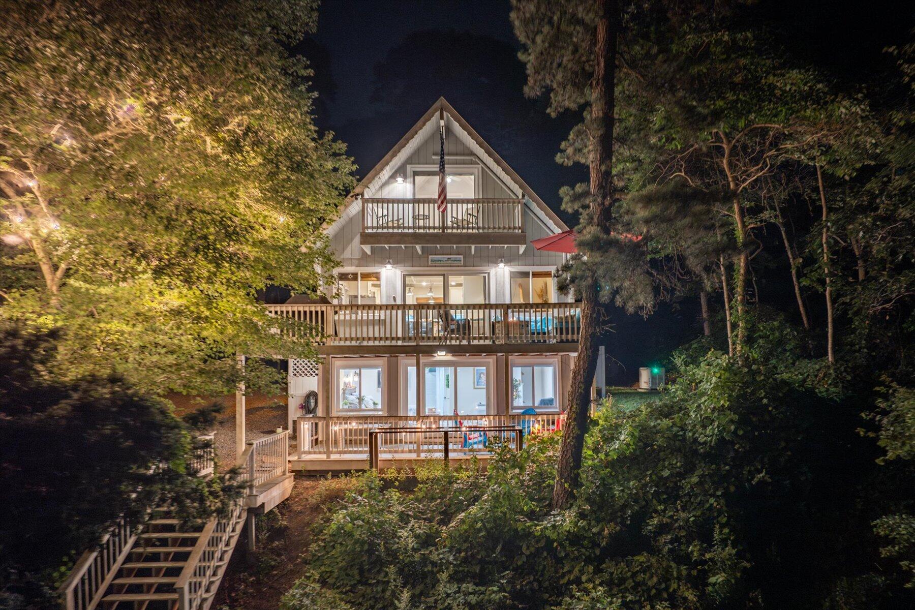 120 Wheeler Road Mashpee, MA 02649 - Photo 49 of 49 a front view of a house with a yard