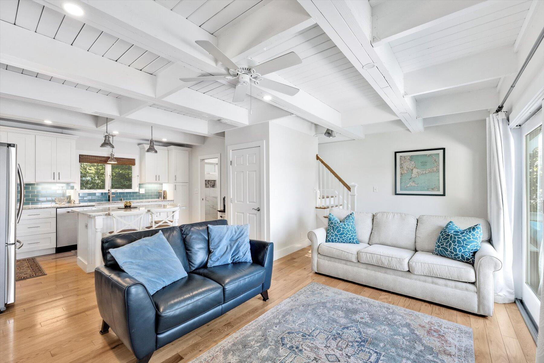 120 Wheeler Road Mashpee, MA 02649 - Photo 9 of 49 a living room with furniture and a view of kitchen