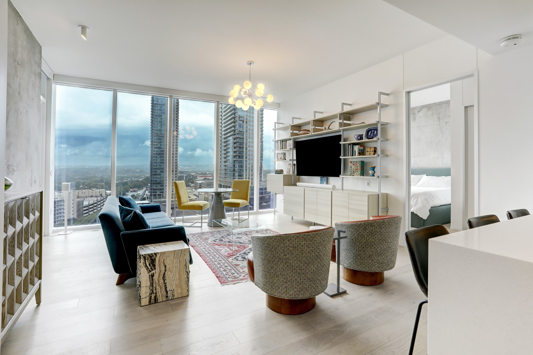 a living room with fireplace furniture and a flat screen tv