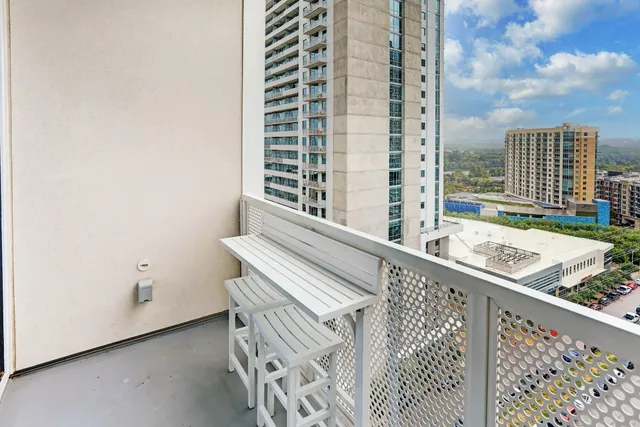 a view of balcony with a white wall