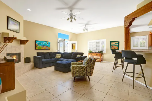 a living room with furniture and a window