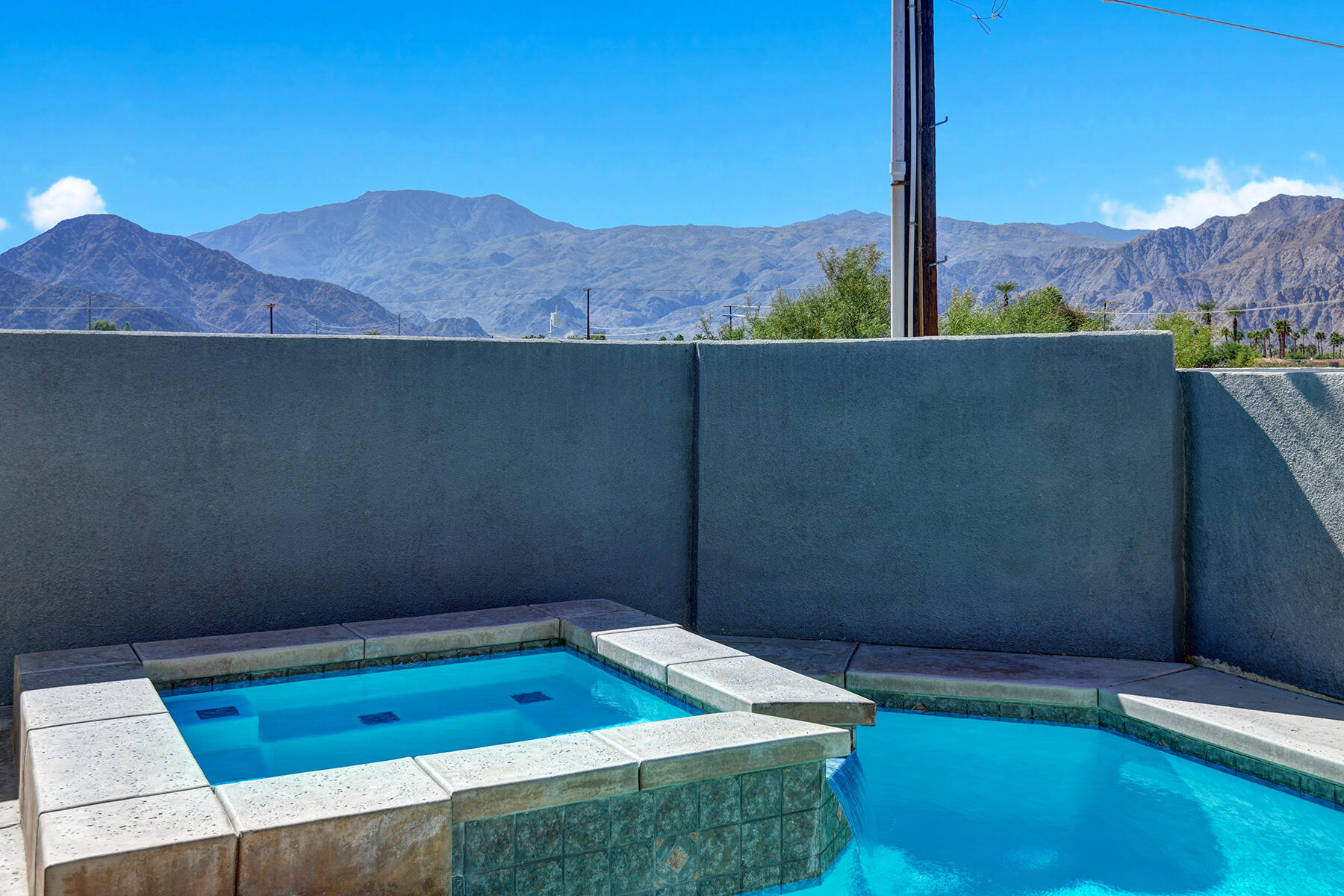 78595 Saguaro Road La Quinta, CA 92253 - Photo 30 of 30 a view of a backyard with a barbeque