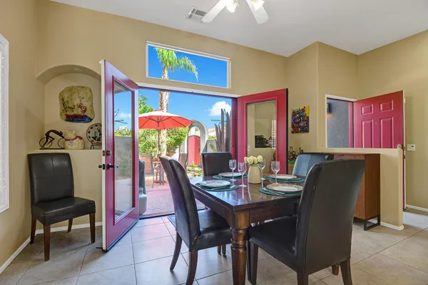 a view of a dining room with furniture