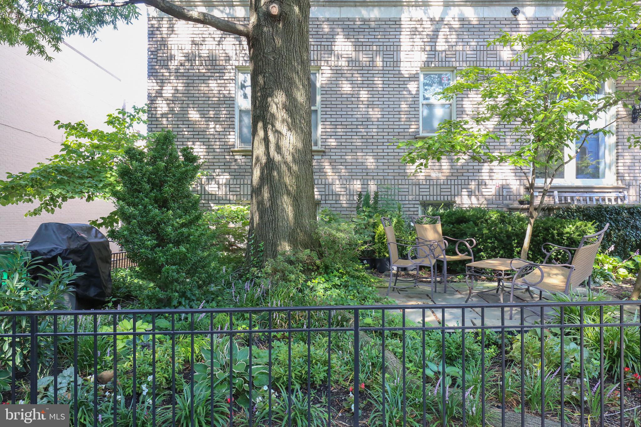 1916 17th Street Northwest, Unit 113 Washington, DC 20009 - Photo 22 of 28 Front patio with shared grill and seating.