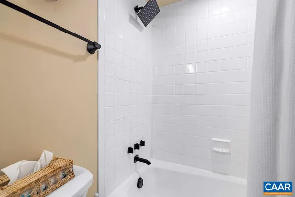 a bathroom with a sink and washing machine