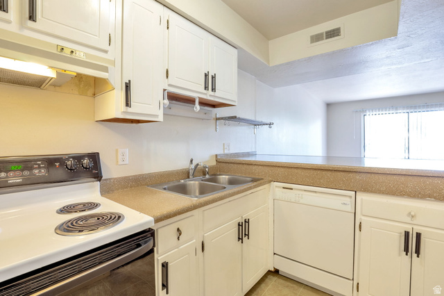 290 North 500 West, Unit 211 Bountiful, UT 84010 - Photo 9 of 21 Kitchen Looking Into Living Room