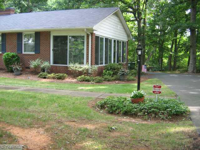 317 Hartgrove Road King, NC 27021 - Photo 3 of 11 Exterior Front. Sunroom