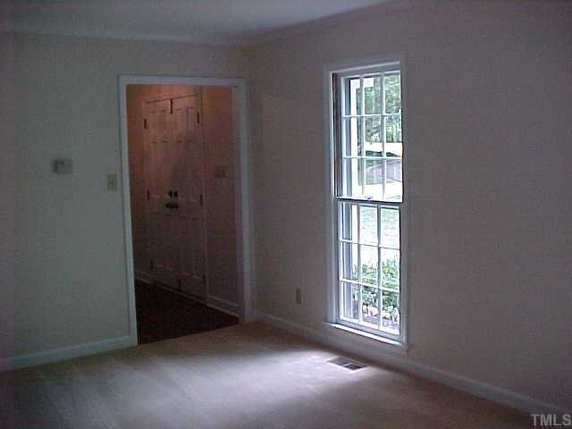 2000 Flagstone Place Raleigh, NC 27612 - Photo 6 of 10 Large Living Room is freshly painted.