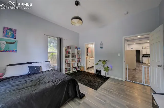 a bedroom with a bed and a cabinets