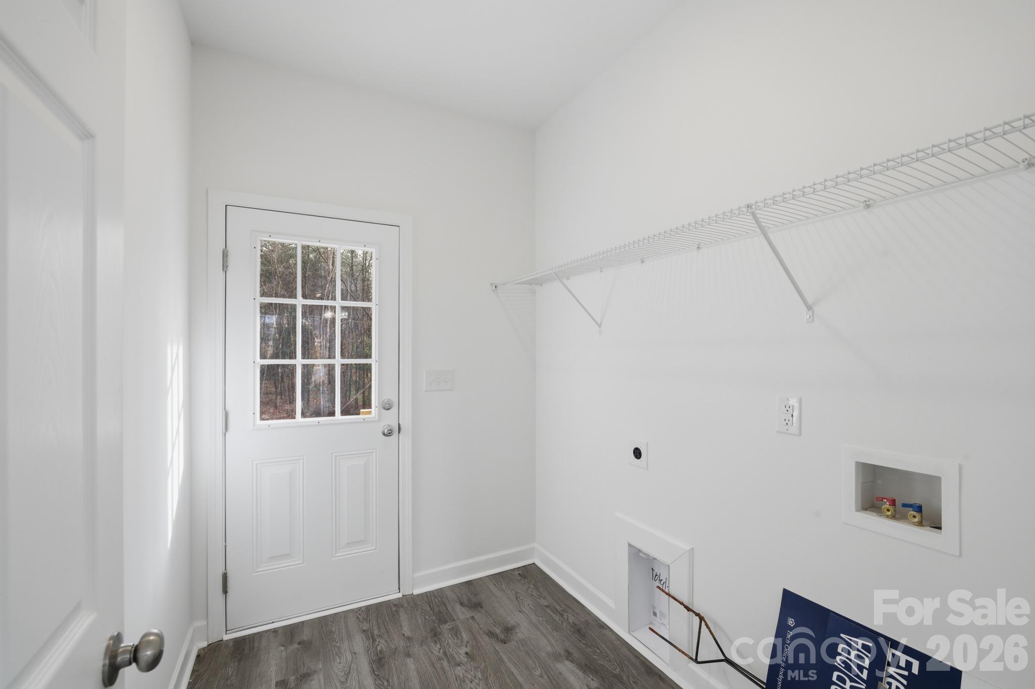 368 Lippard Farm Road Statesville, NC 28625 - Photo 17 of 29 a view of an empty room with wooden floor and windows