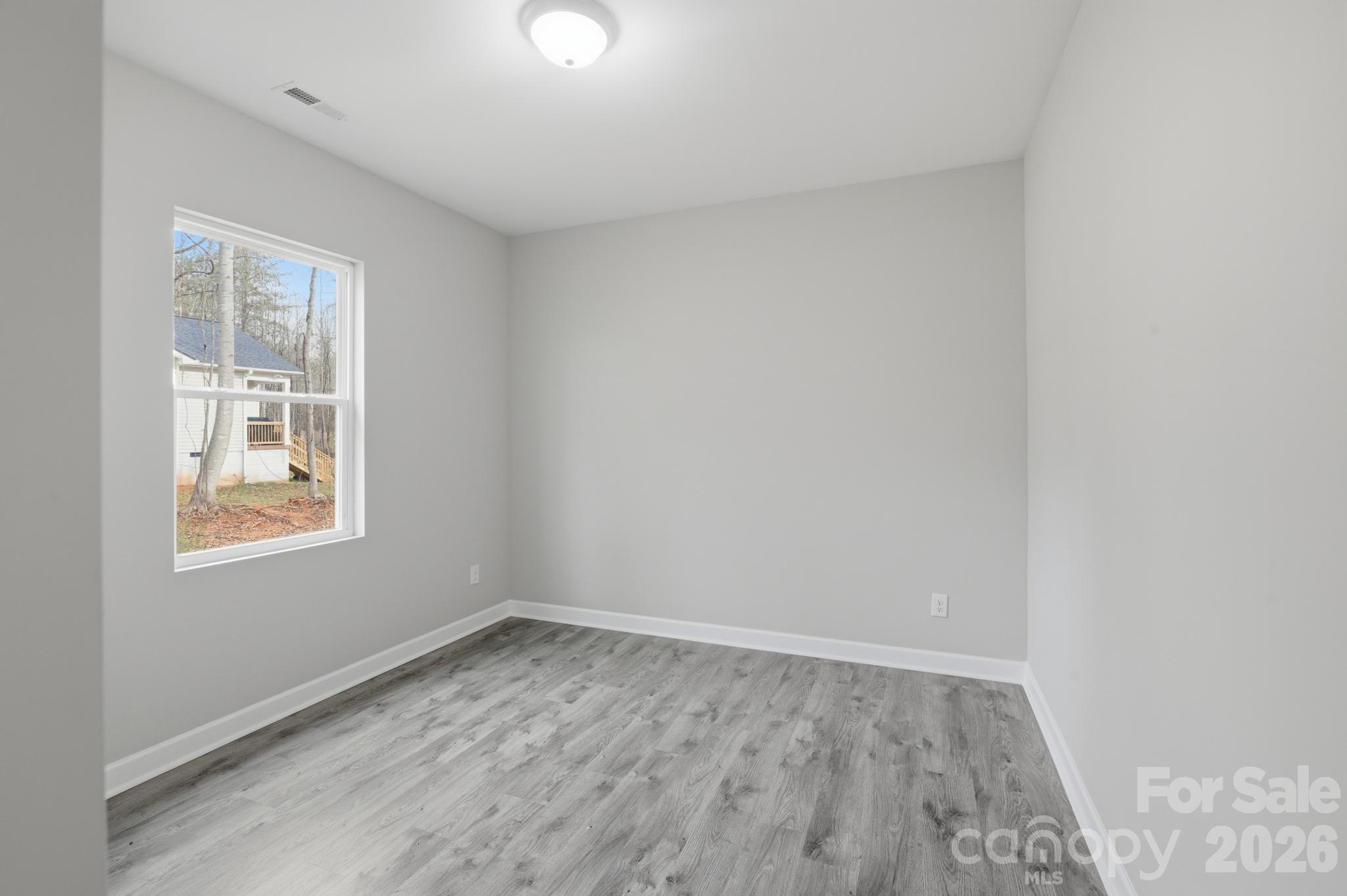 368 Lippard Farm Road Statesville, NC 28625 - Photo 24 of 29 an empty room with a window
