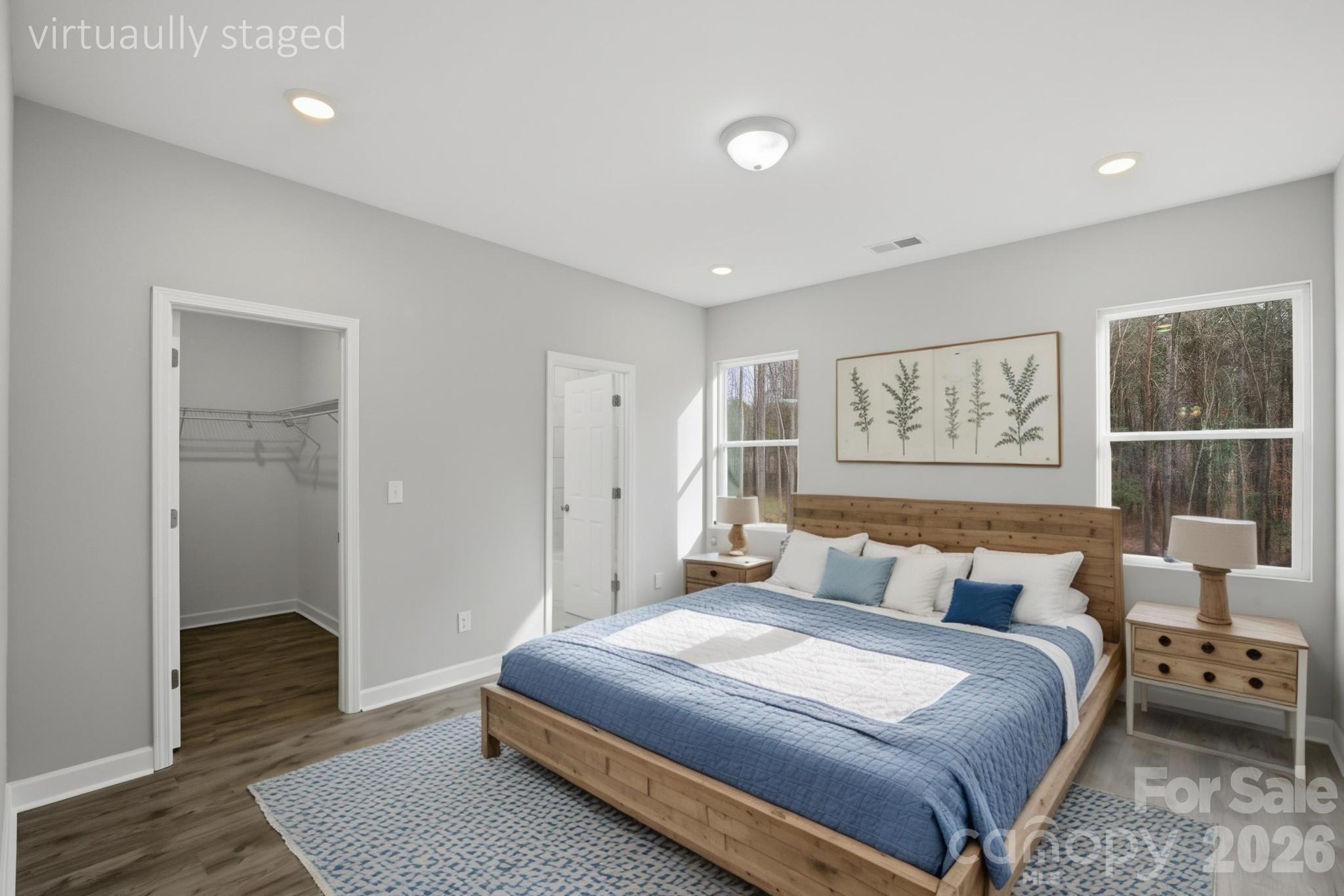 368 Lippard Farm Road Statesville, NC 28625 - Photo 10 of 29 a bedroom with a large bed and a window