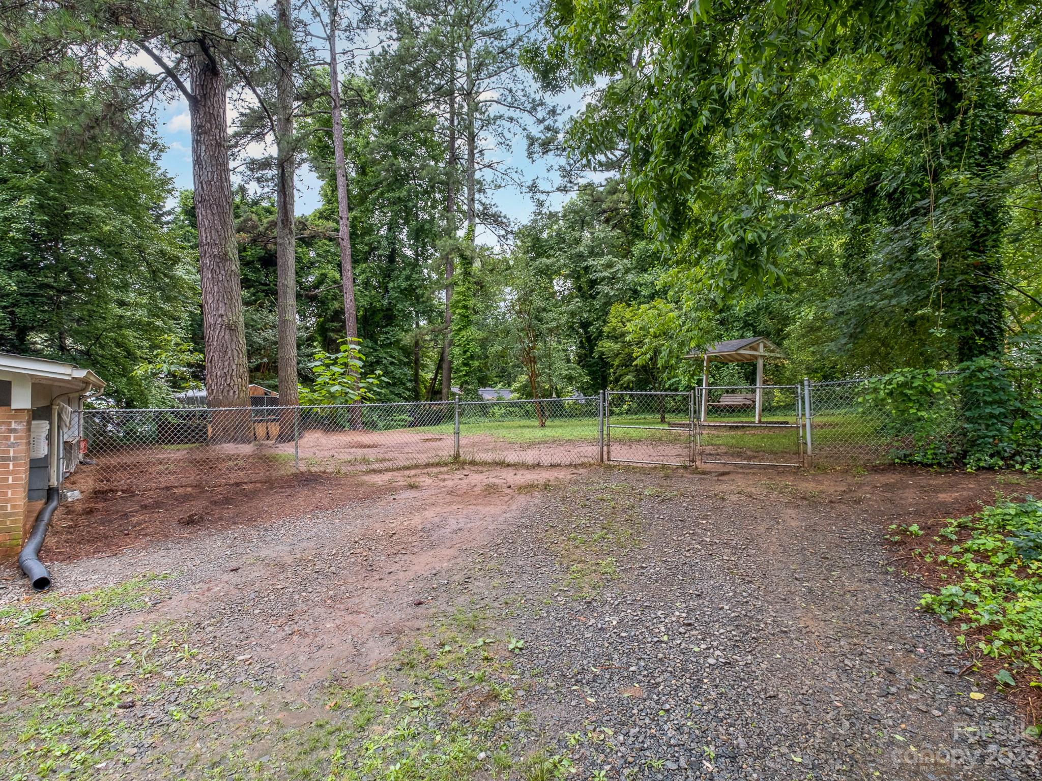 648 Blacksnake Road Stanley, NC 28164 - Photo 24 of 24 a view of outdoor space with trees