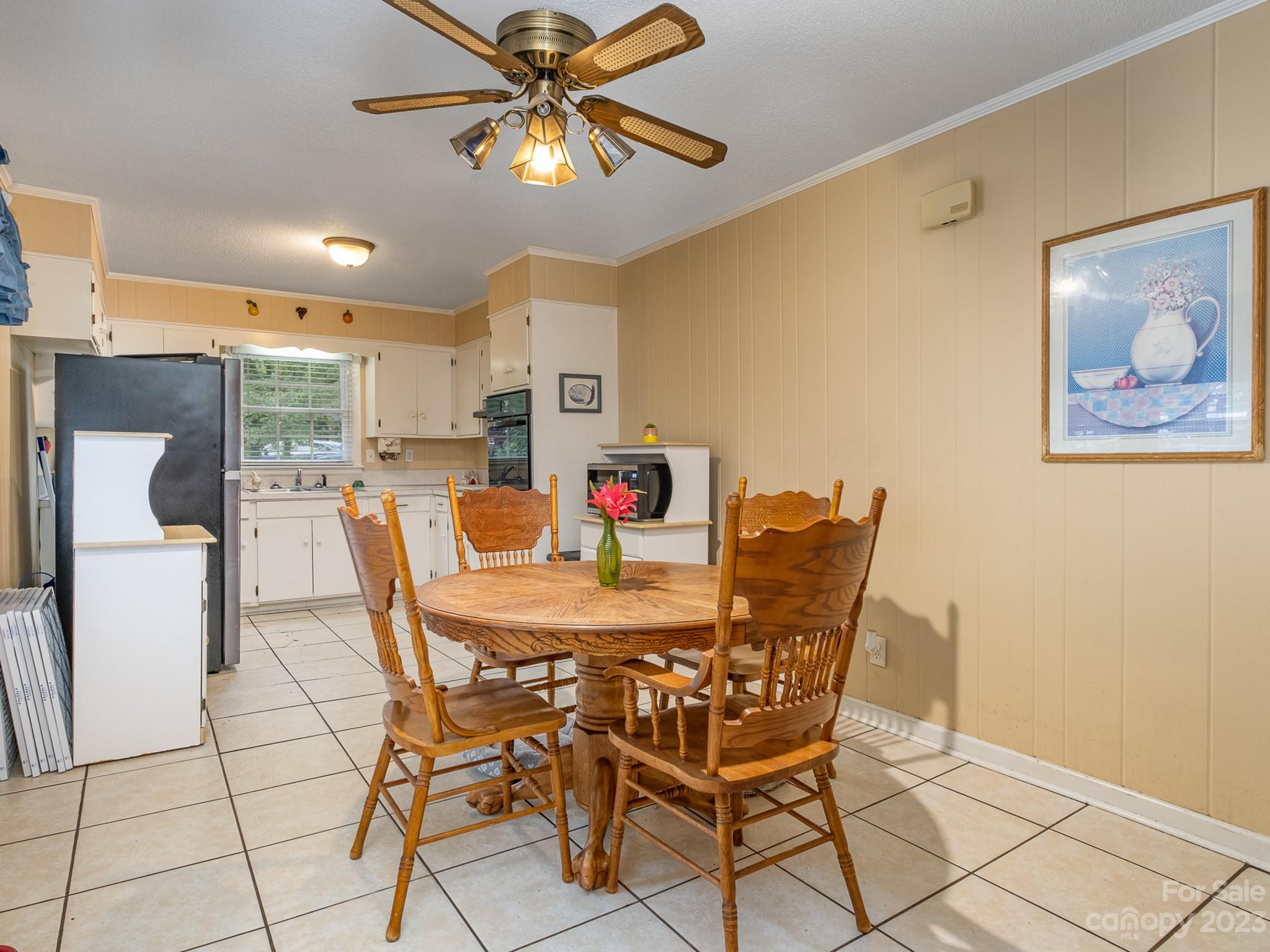 648 Blacksnake Road Stanley, NC 28164 - Photo 10 of 24 a view of a dining room with furniture