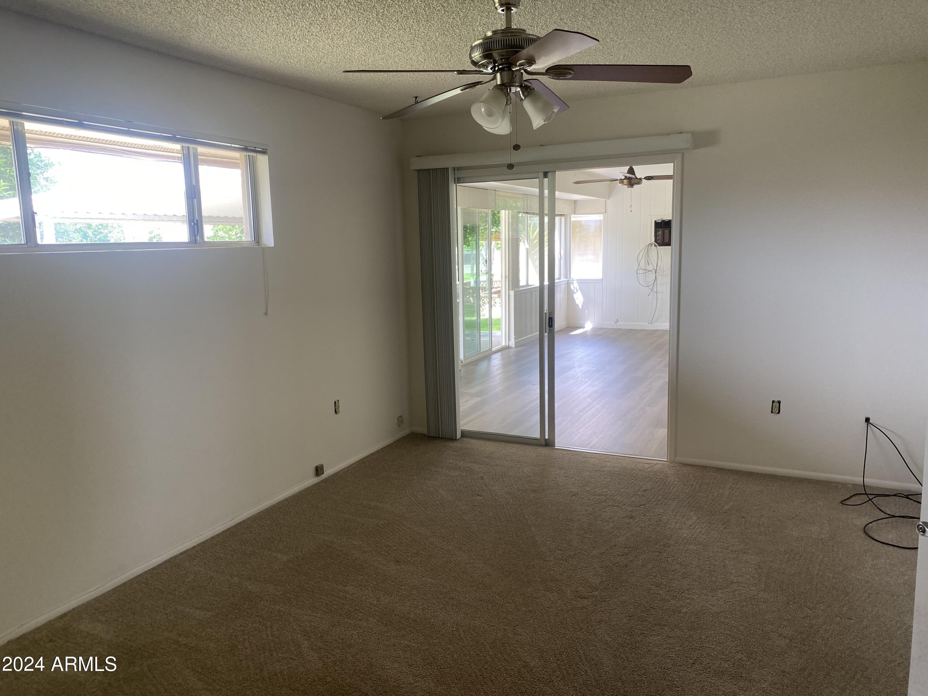 10127 West Mountain View Road Sun City, AZ 85351 - Photo 7 of 14 master bedroom