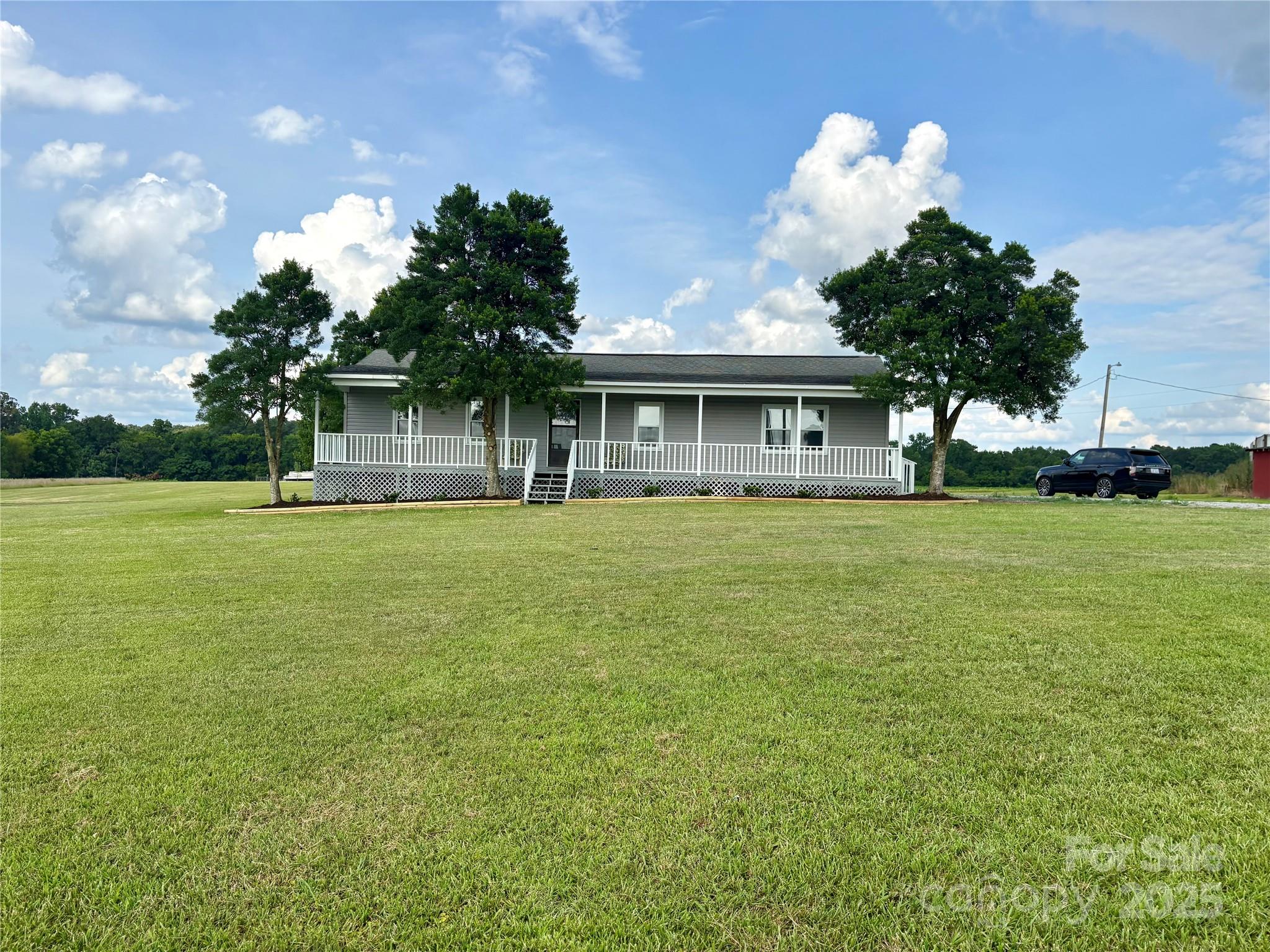 3123 Stack Road Monroe, NC 28112 - Photo 2 of 28 a front view of a house with garden