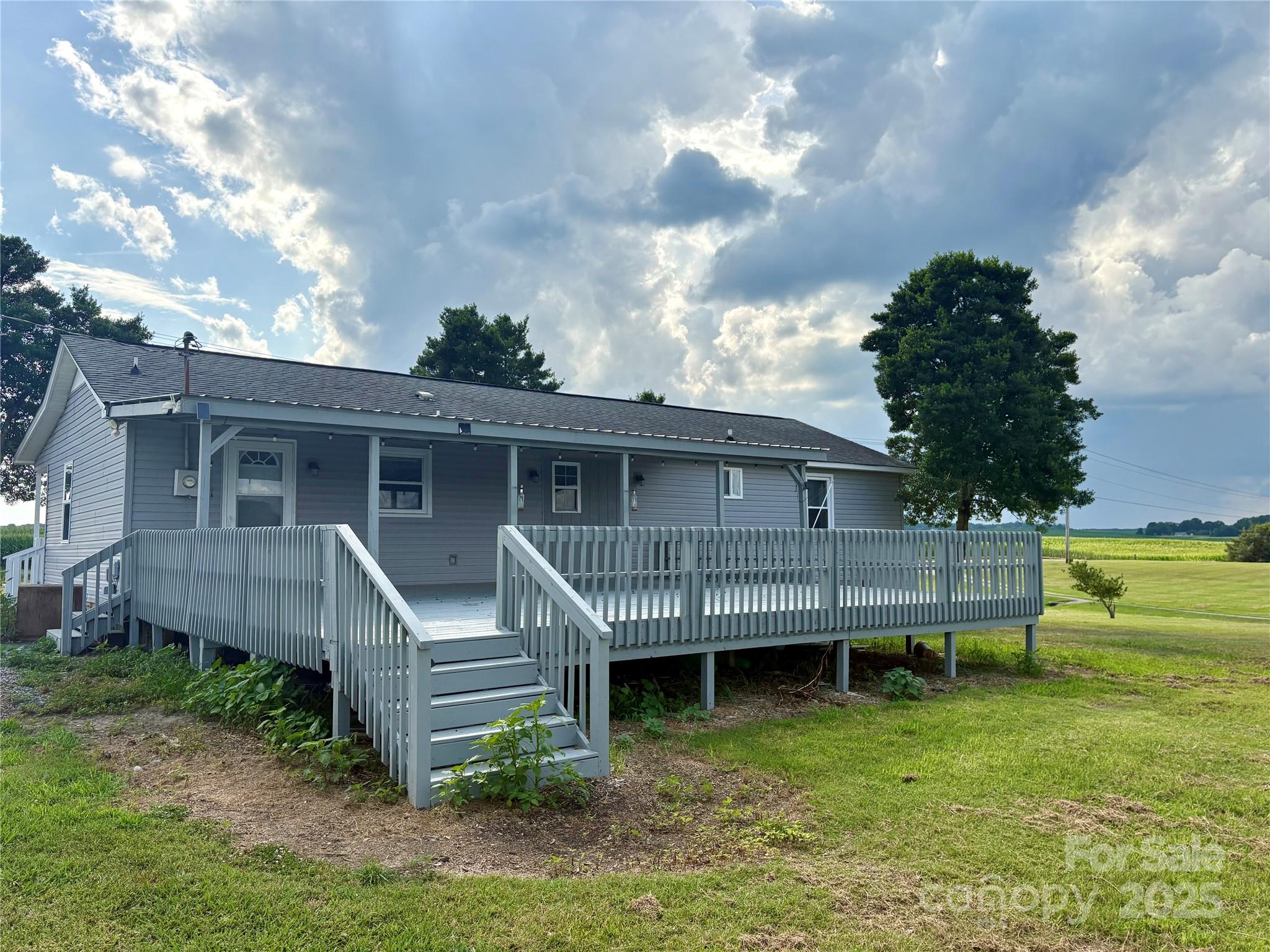 3123 Stack Road Monroe, NC 28112 - Photo 28 of 28 a front view of a house with a garden