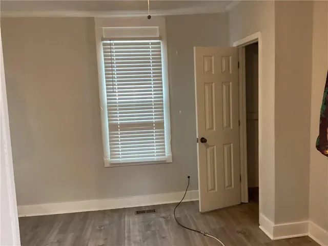 a view of a room that has a window in it