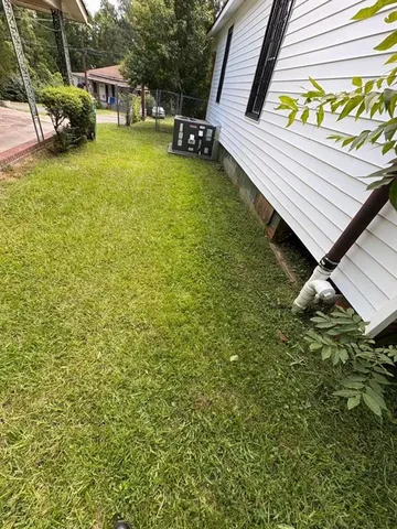 a view of an outdoor space and swimming pool