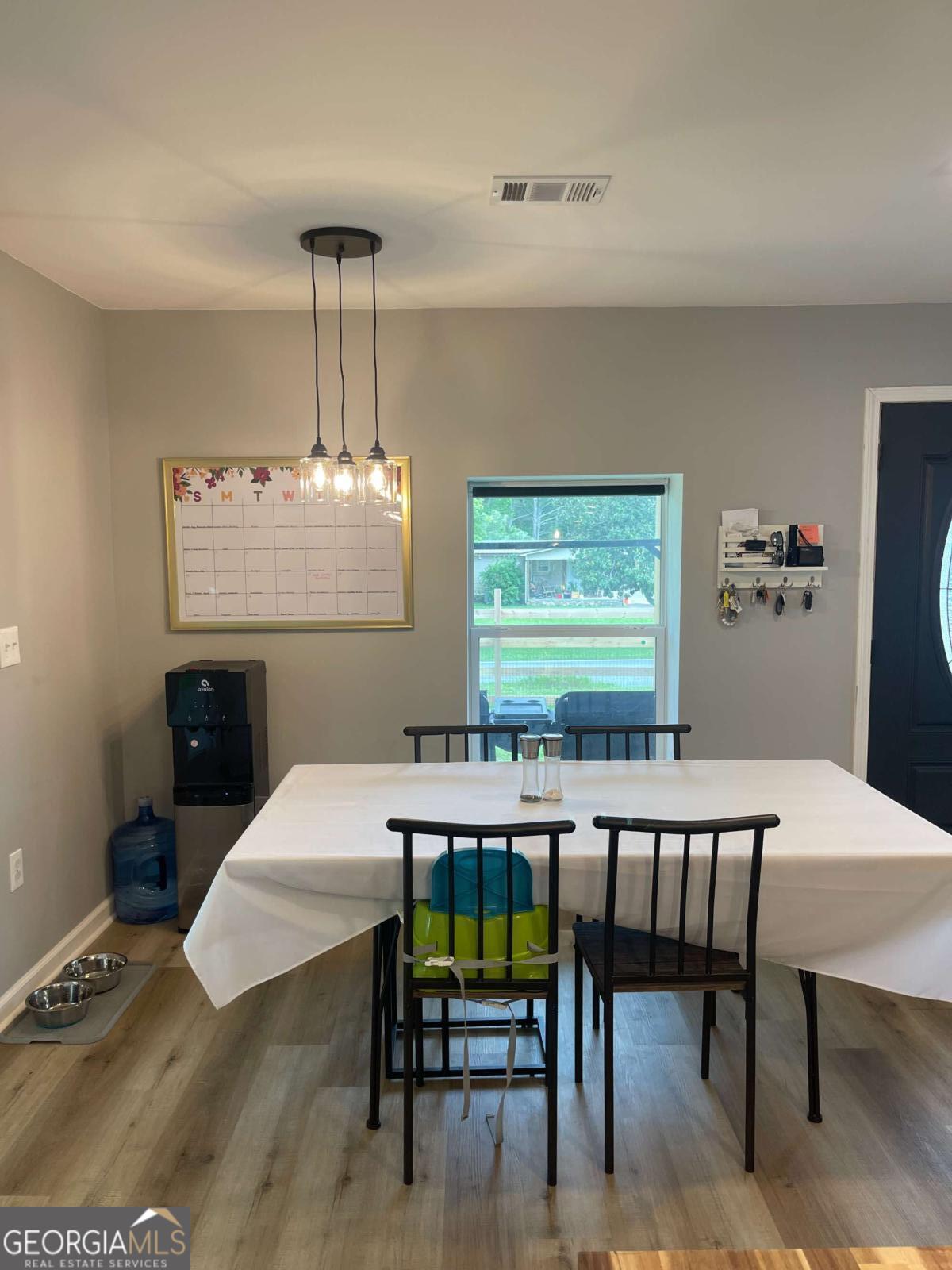 433 Spring Place Resaca Road Chatsworth, GA 30705 - Photo 12 of 60 a view of a dining room with furniture
