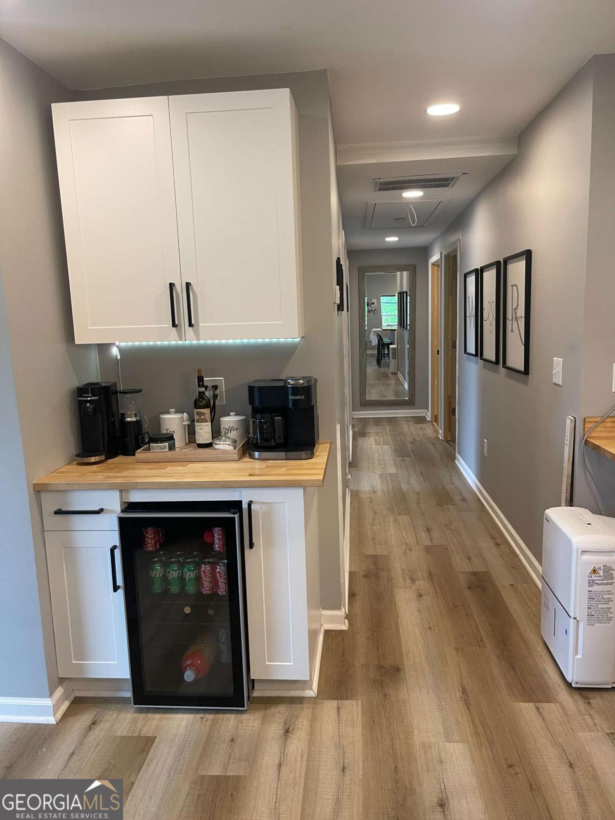 433 Spring Place Resaca Road Chatsworth, GA 30705 - Photo 15 of 60 a kitchen with stainless steel appliances granite countertop a stove a sink and a microwave