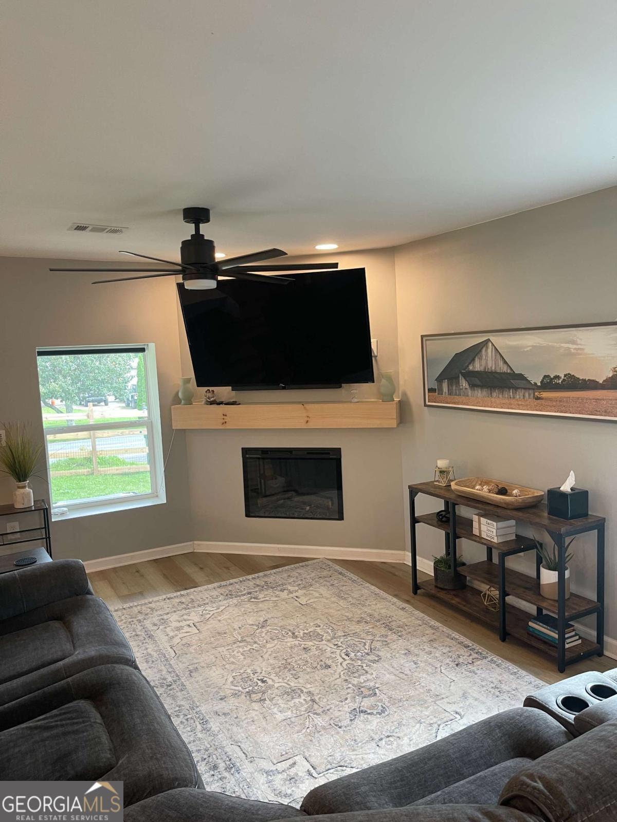 433 Spring Place Resaca Road Chatsworth, GA 30705 - Photo 23 of 60 a living room with furniture and a flat screen tv