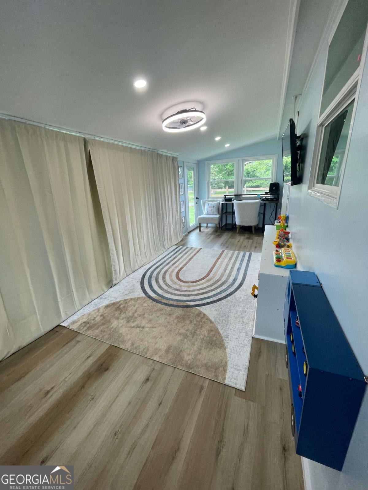 433 Spring Place Resaca Road Chatsworth, GA 30705 - Photo 30 of 60 a view of a livingroom with furniture and a chandelier