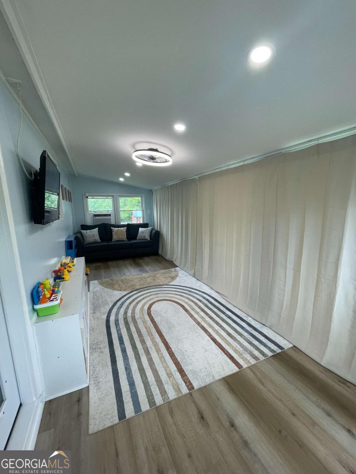 433 Spring Place Resaca Road Chatsworth, GA 30705 - Photo 31 of 60 a view of livingroom with furniture and flat screen tv