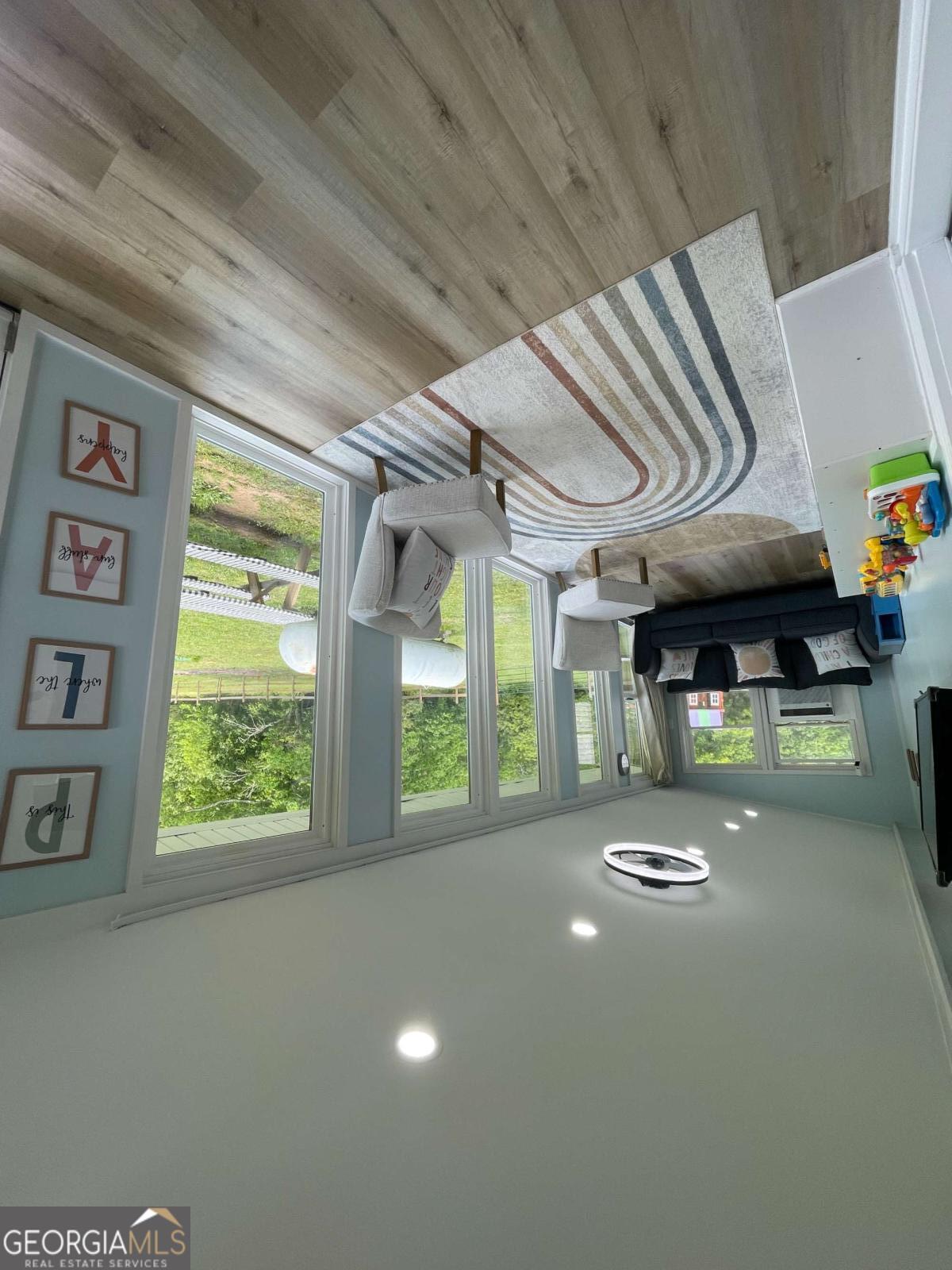 433 Spring Place Resaca Road Chatsworth, GA 30705 - Photo 34 of 60 a view of an empty room with a window