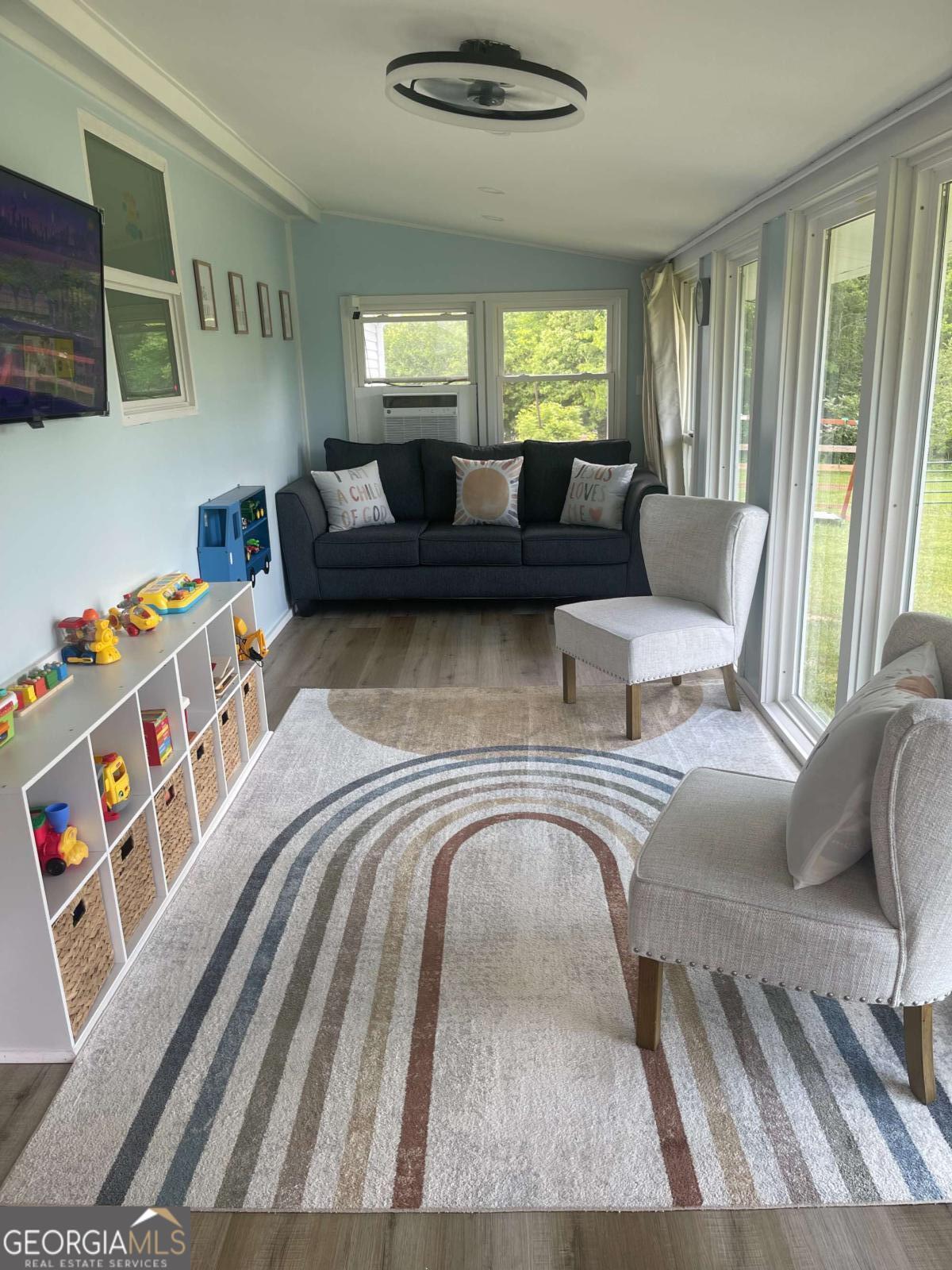433 Spring Place Resaca Road Chatsworth, GA 30705 - Photo 36 of 60 a living room with furniture and a large window