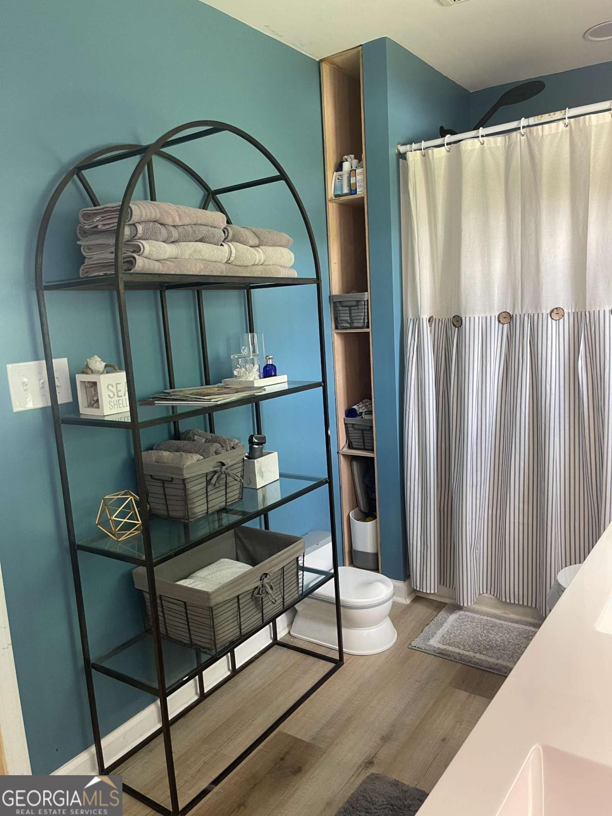 433 Spring Place Resaca Road Chatsworth, GA 30705 - Photo 38 of 60 a living room with furniture and a mirror