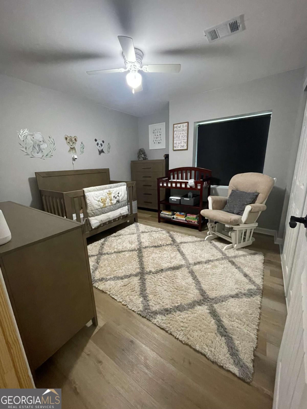 433 Spring Place Resaca Road Chatsworth, GA 30705 - Photo 46 of 60 a living room with furniture and a chandelier