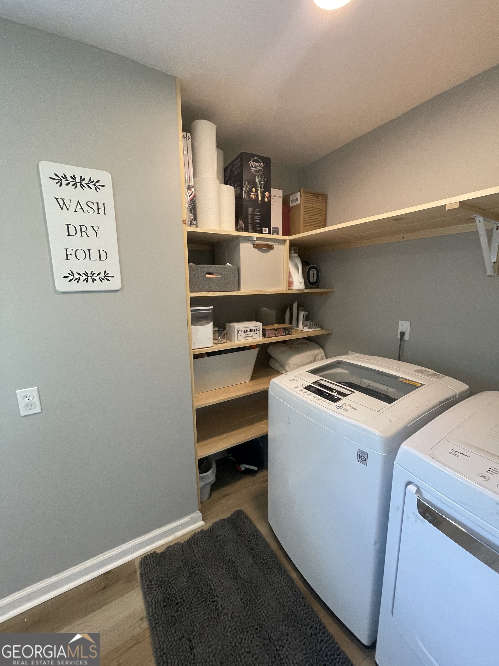 433 Spring Place Resaca Road Chatsworth, GA 30705 - Photo 49 of 60 a view of storage and utility room with washer and dryer