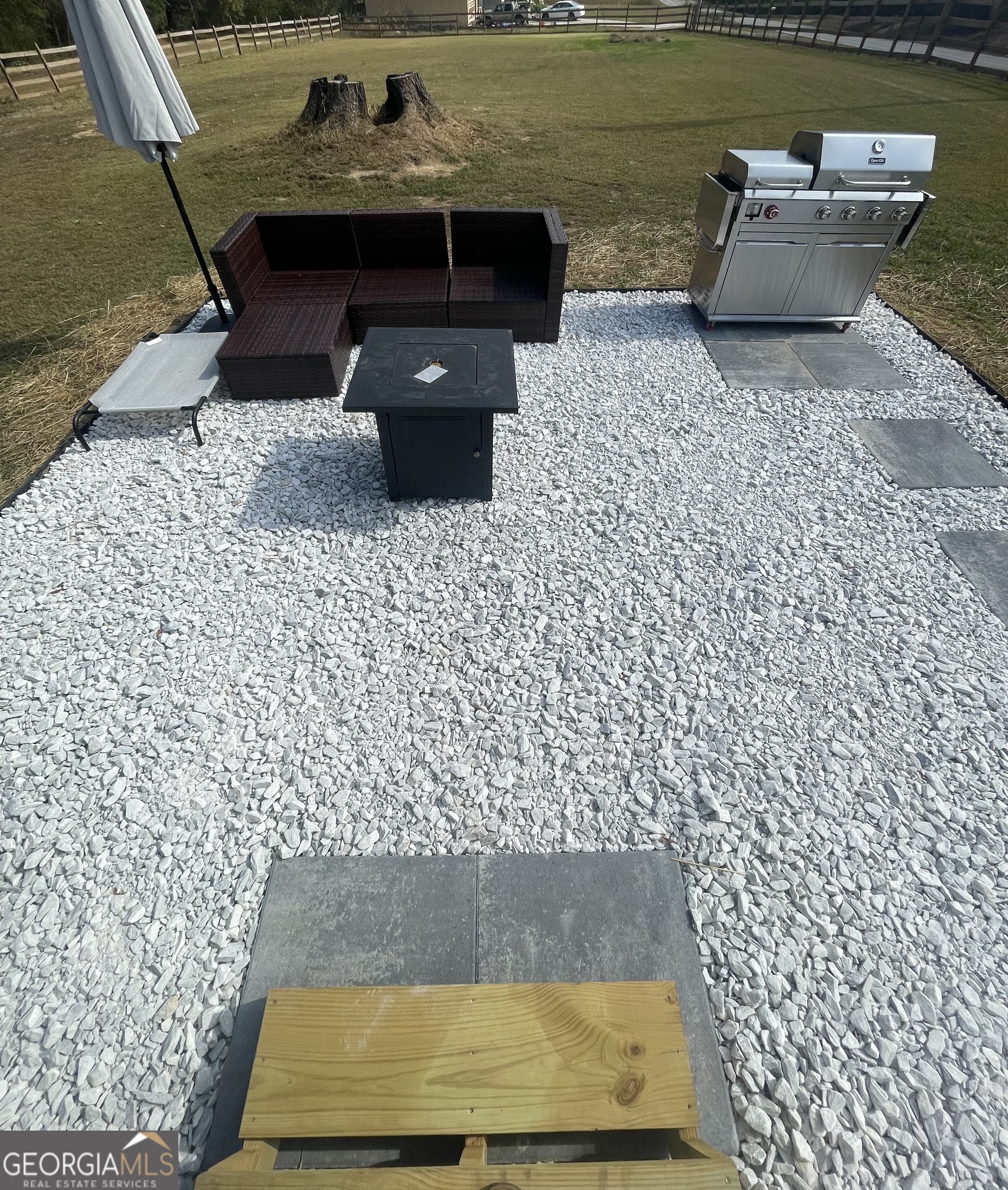 433 Spring Place Resaca Road Chatsworth, GA 30705 - Photo 6 of 60 a view of swimming pool with a table and chairs in wooden floor
