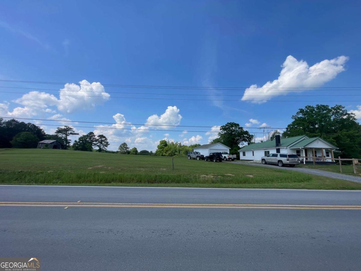 433 Spring Place Resaca Road Chatsworth, GA 30705 - Photo 8 of 60 a view of a golf course with a garden