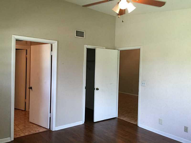21955 Tidewater Terrace, Unit 208 Boca Raton, FL 33433 - Photo 11 of 26 a view of empty room with wooden floor